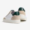 Sneaker in pelle e camoscio con lacci e zip