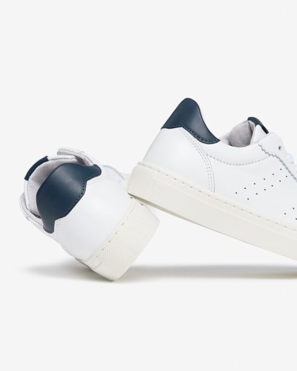 B0E83A663D9C25773BFA7030B63B0370_ Sneaker in pelle e tessuto tecnico con lacci e zip