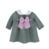 Completo due pezzi con fiocco e cappellino