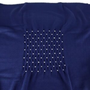 52F8A36C1EE6F953EDECC671D34CBB1B_ Copertina con ricamo punto smock