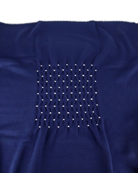 Copertina con ricamo punto smock