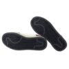Sneaker in ecopelle con lacci