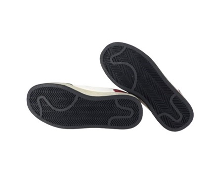 Sneaker in ecopelle con lacci