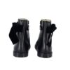 Stivaletto in pelle con fiocchetto in velluto e zip