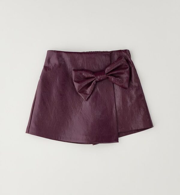 Gonna/short effetto pelle con fiocco