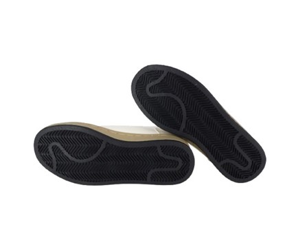 Sneaker in eco pelle con lacci